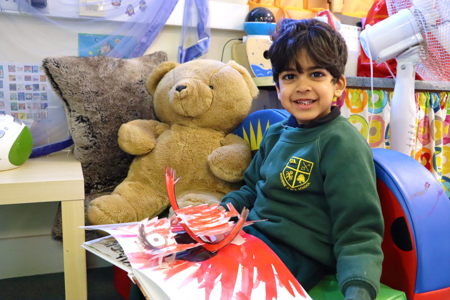 pupil reading wellness book in PSHE at shorne primary school