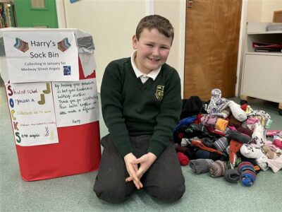 harry from shorne primary school collecting socks for medway street angels