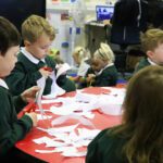 IMG_1041 children cutting up paper